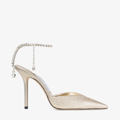 حذاء بكعب Jimmy Choo بحزام كريستال، قماش Brilliance بلاتيني