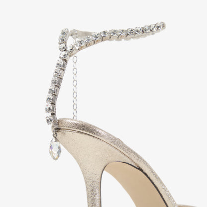 حذاء بكعب Jimmy Choo بحزام كريستال، قماش Brilliance بلاتيني