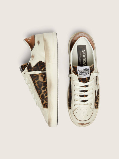 حذاء رياضي Stardan من Golden Goose، جلد أبيض وجلد مهر بنقشة النمر