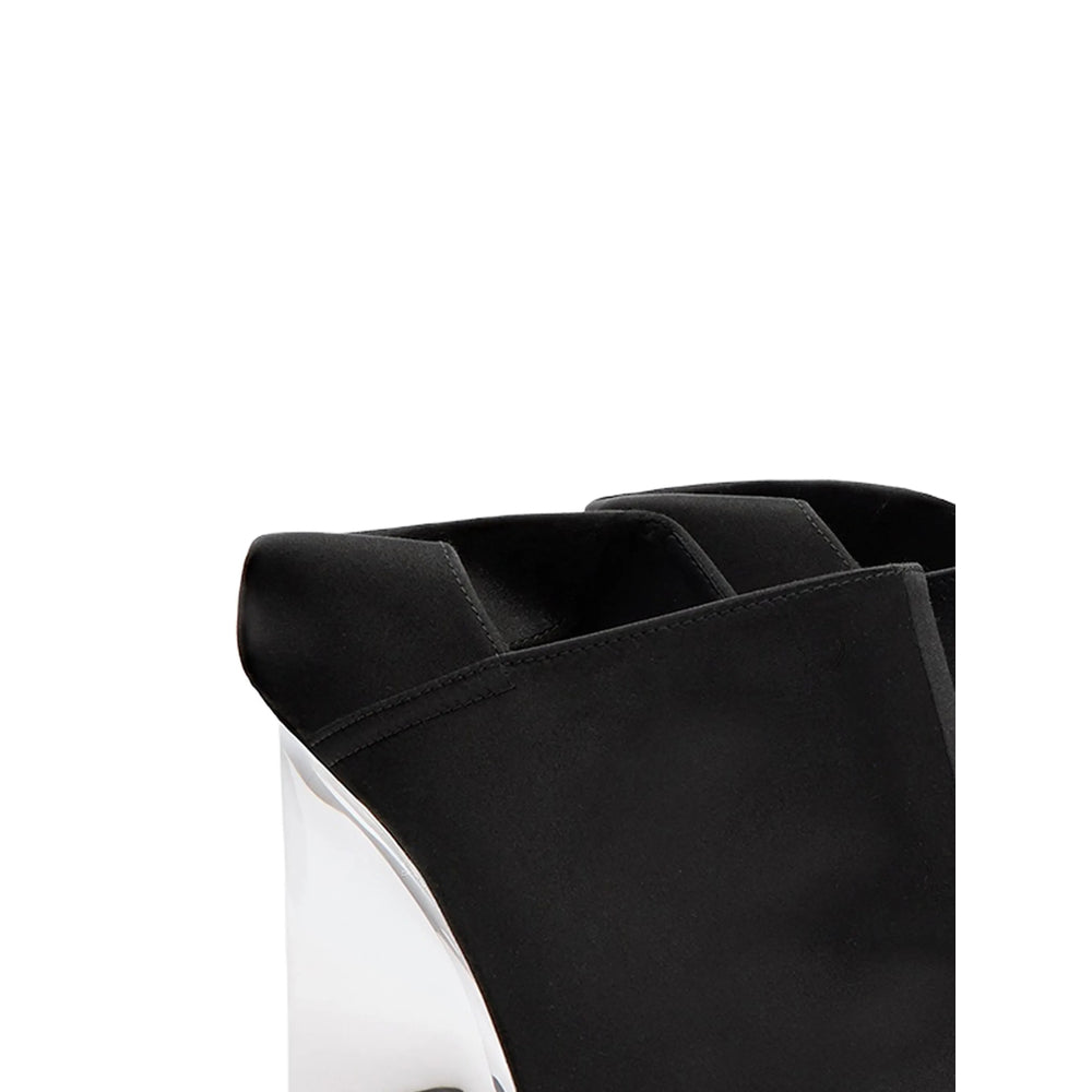 Alaïa Knit Ballet Flats in black — side profile | La Parisienne Qatar