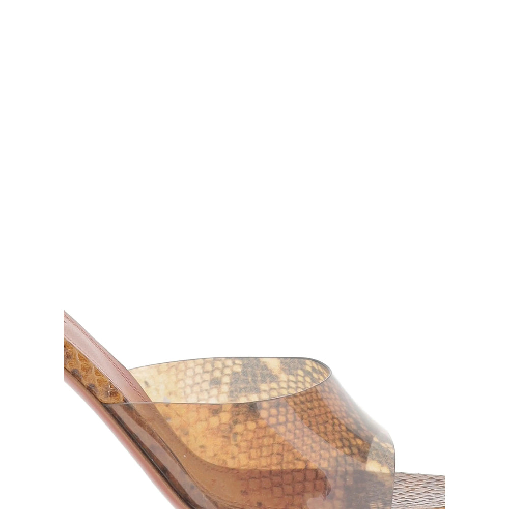 Amina Muaddi Lupita Glass 95 sandals in brown — side profile | La Parisienne Qatar