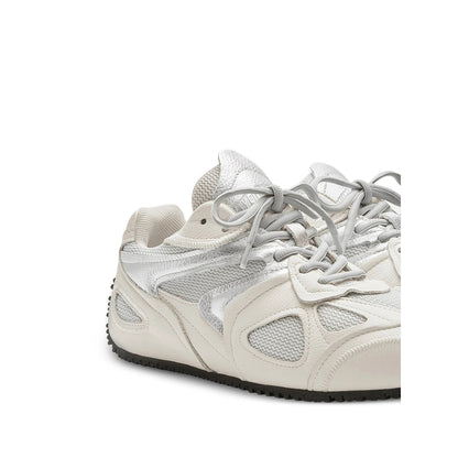 Axel Arigato Slow sneakers in neutral tones — detail view | La Parisienne Qatar