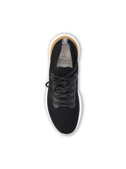 Brunello Cucinelli knitted runners in black cotton — side profile | La Parisienne Qatar
