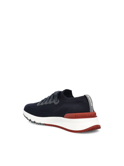 Brunello Cucinelli knitted runners in blue cotton — detail view | La Parisienne Qatar