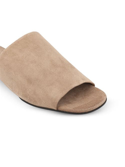 Brunello Cucinelli suede mules in beige — rear view | La Parisienne Qatar