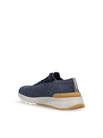 Brunello Cucinelli wool knit runners in blue — detail view | La Parisienne Qatar