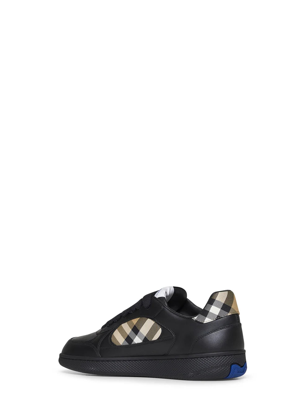 Burberry trainers in calf grain leather — side profile | La Parisienne Qatar