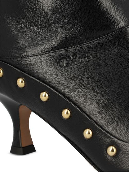 Chloé studded ankle boots in black leather — side profile | La Parisienne Qatar