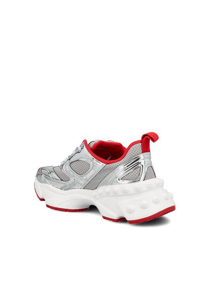 Christian Louboutin sneakers in silver laminated calf leather — detail view | La Parisienne Qatar