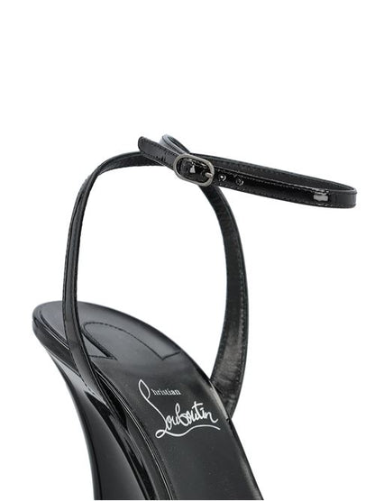 Christian Louboutin wedge sandals in black leather — side profile | La Parisienne Qatar