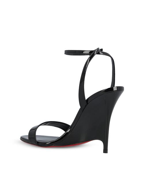 Christian Louboutin wedge sandals in black leather — detail view | La Parisienne Qatar