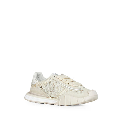 Dolce & Gabbana sneakers in neutral calf suede — side profile | La Parisienne Qatar