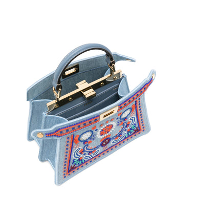 Fendi bag in blue denim — side profile | La Parisienne Qatar