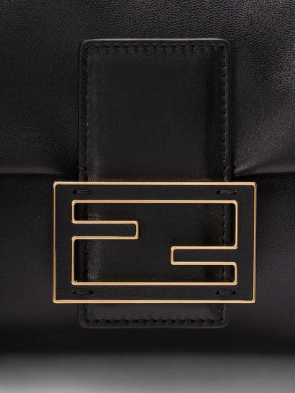 Fendi Mamma Baguette Large shoulder bag in black nappa leather — styling view | La Parisienne Qatar