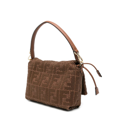 Fendi raffia bag in natural brown — side profile | La Parisienne Qatar