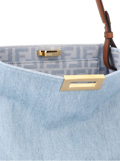 Fendi Way medium light blue denim bag — side profile | La Parisienne Qatar