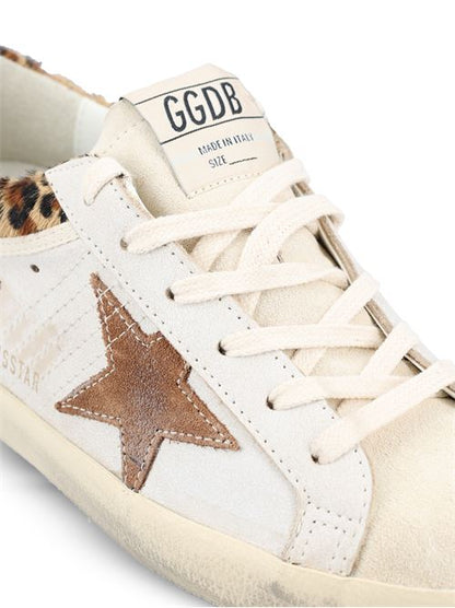 Golden Goose sneakers with leopard pony-style heel — side profile | La Parisienne Qatar