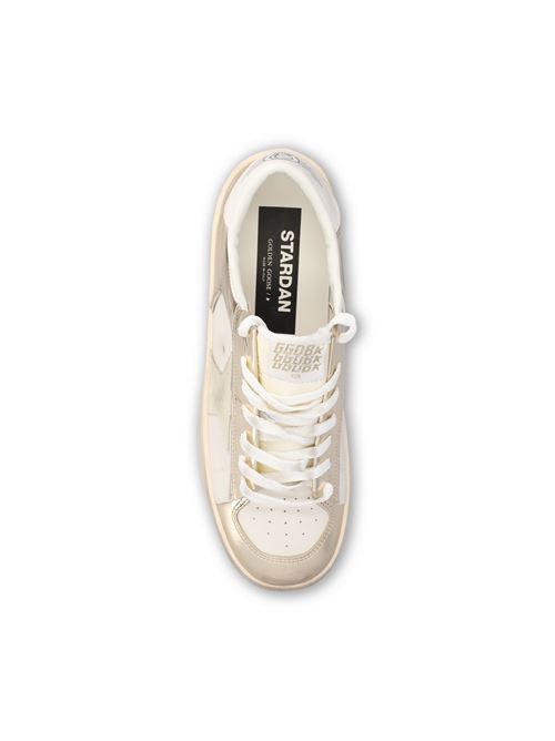 Golden Goose Stardan sneakers in white and gold leather — side profile | La Parisienne Qatar