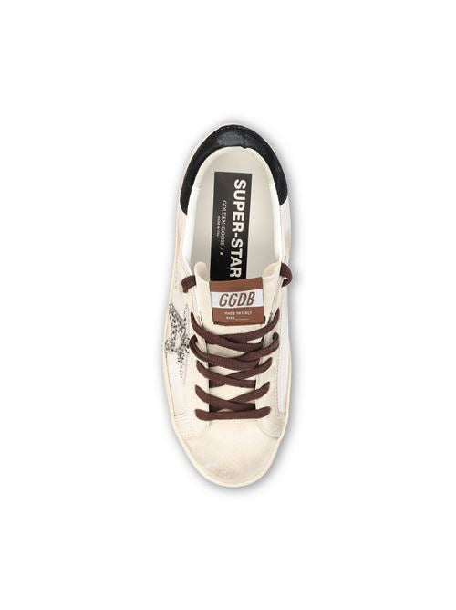 Golden Goose Super-Star sneakers in white and black leather — side profile | La Parisienne Qatar