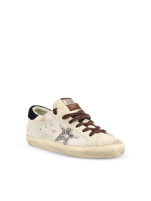Golden Goose Super-Star sneakers in white and black leather — detail view | La Parisienne Qatar