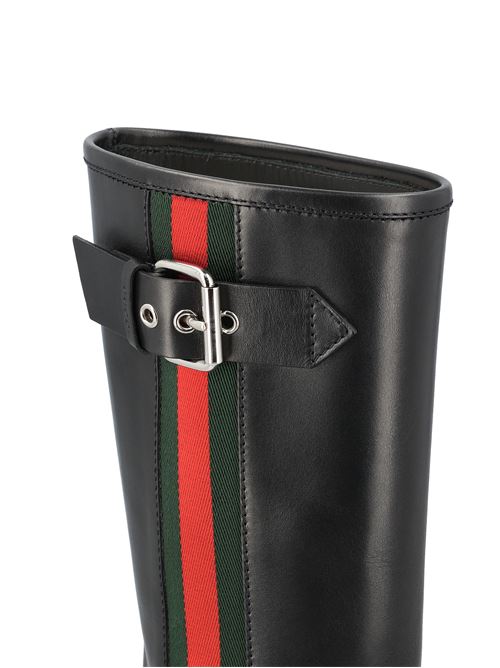 Gucci Web biker boots in black leather — side profile | La Parisienne Qatar
