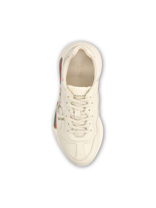 Gucci Rhyton sneakers in ivory leather — side profile | La Parisienne Qatar