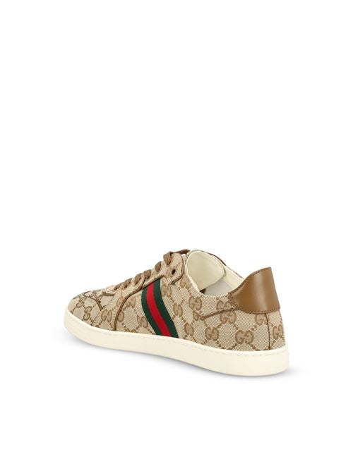 Gucci Stretch low-top sneakers in sand GG canvas — detail view | La Parisienne Qatar