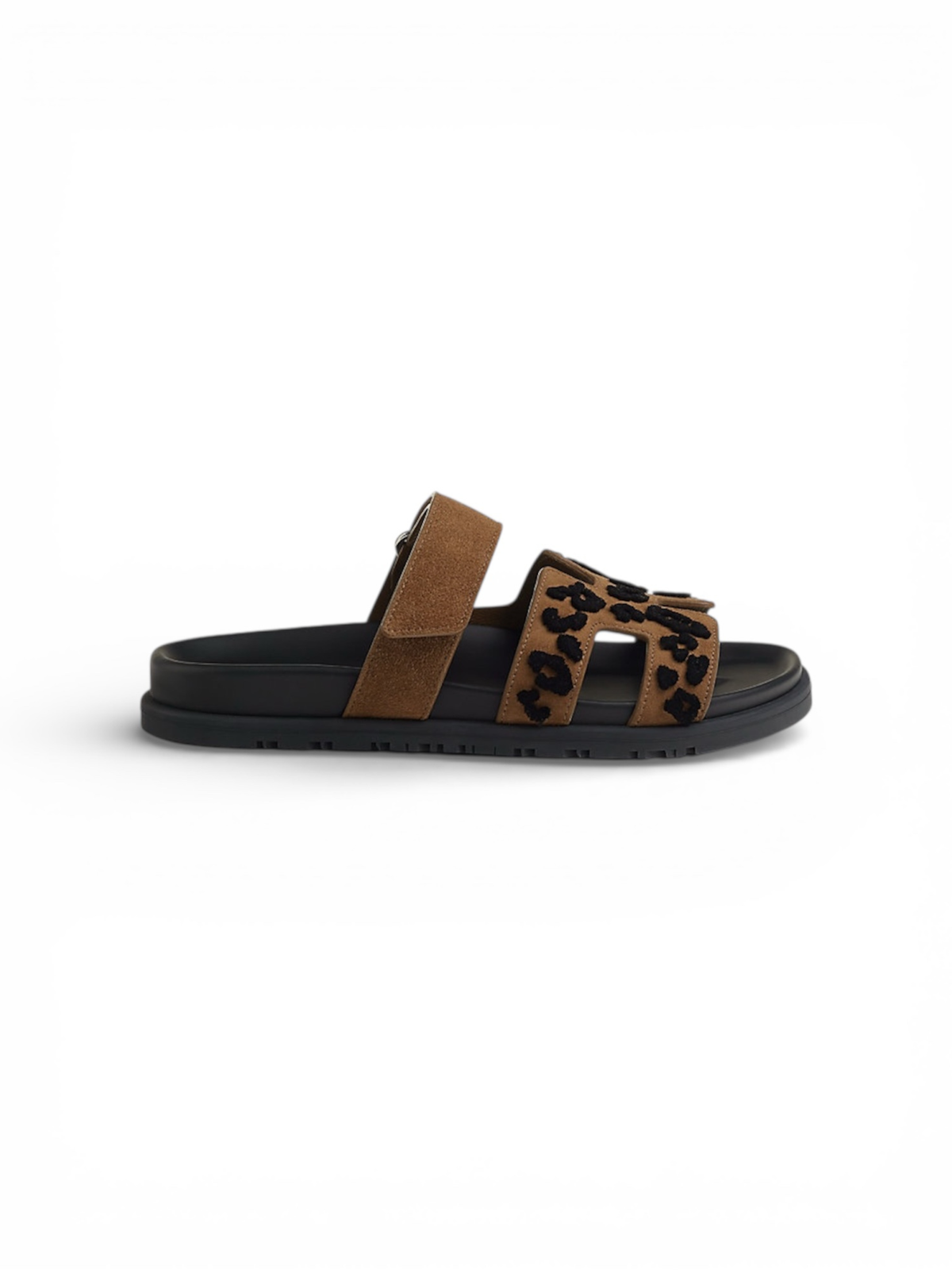 Hermès Chypre smoked brown and black calfskin sandal — side profile | La Parisienne Qatar