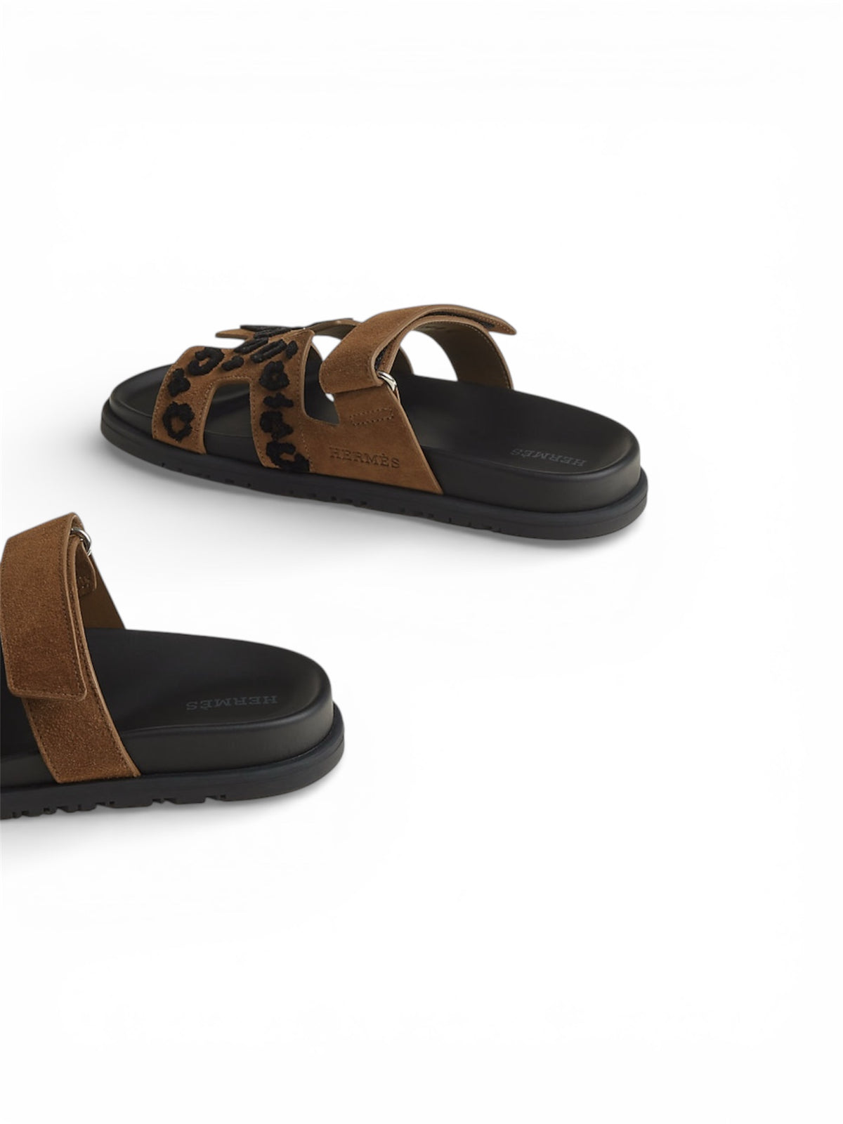 Hermès Chypre smoked brown and black calfskin sandal — rear view | La Parisienne Qatar