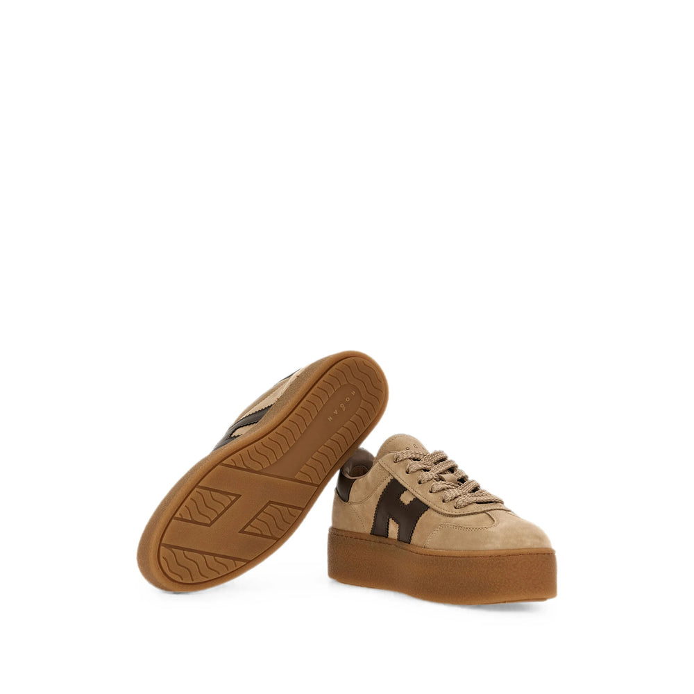 Hogan suede and leather sneakers in neutral — side profile | La Parisienne Qatar