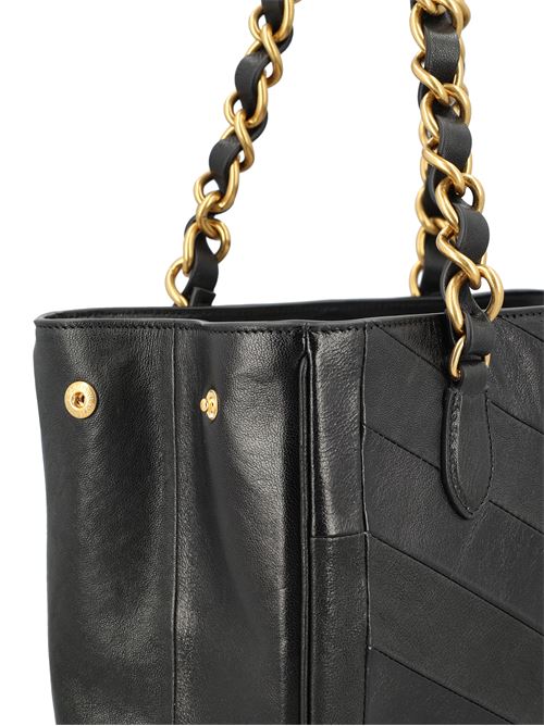 Loewe Hammock Flip bag in brown calfskin — side profile | La Parisienne Qatar
