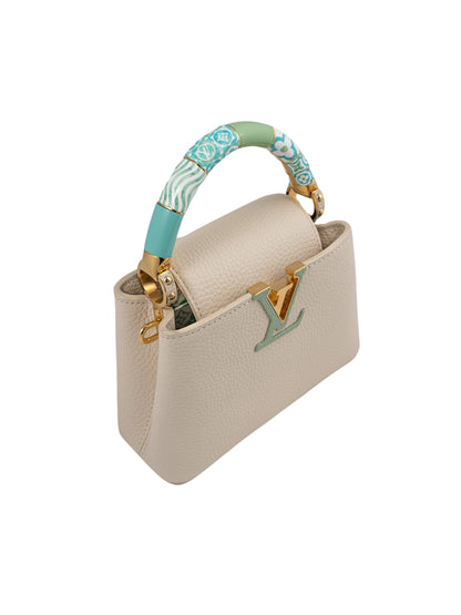 Louis Vuitton Capucines BB bag in cream Taurillon leather — rear view | La Parisienne Qatar