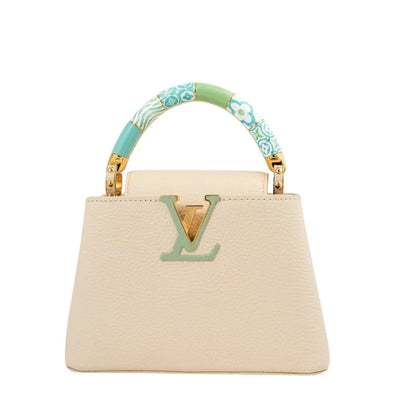 Louis Vuitton Capucines BB bag in cream Taurillon leather — front view | La Parisienne Qatar