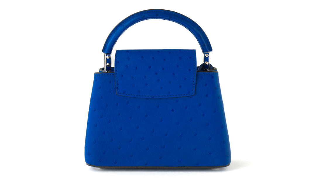 Louis Vuitton Capucines Mini bag in sapphire blue ostrich — alternate angle | La Parisienne Qatar