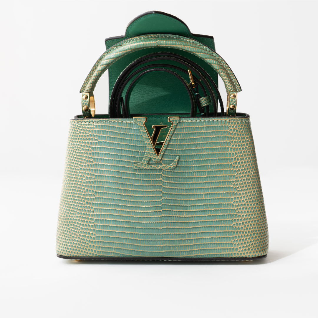 Louis Vuitton Capucines Mini bag in turquoise lizard — styling view | La Parisienne Qatar