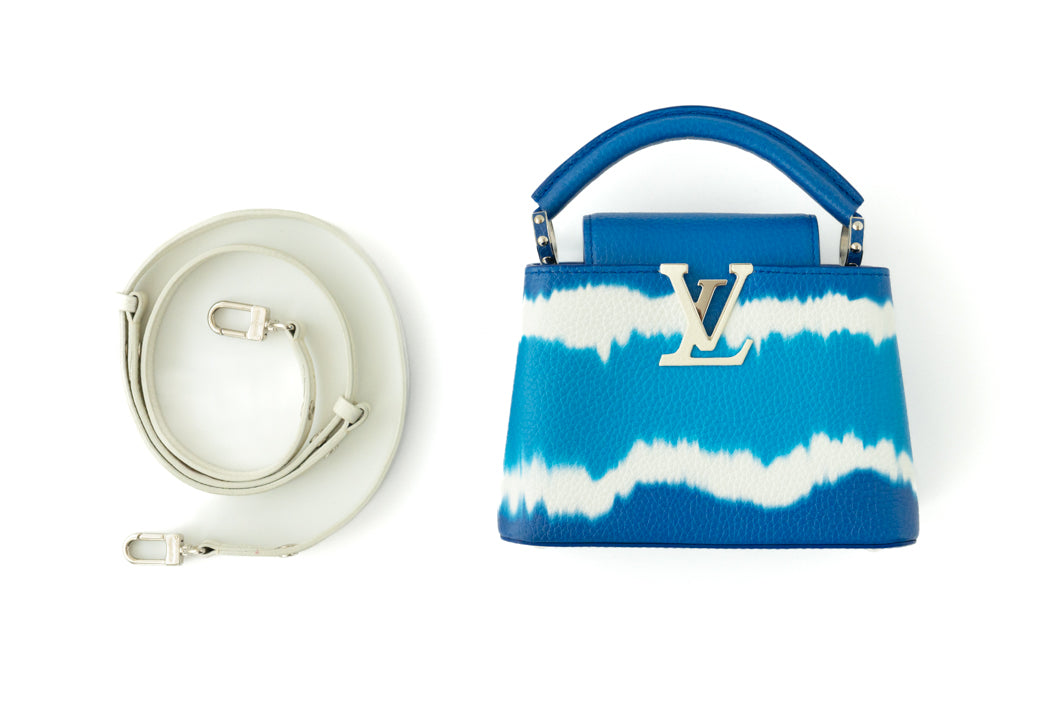 Louis Vuitton Capucines Mini Tie & Dye bag in blue and white — interior view | La Parisienne Qatar