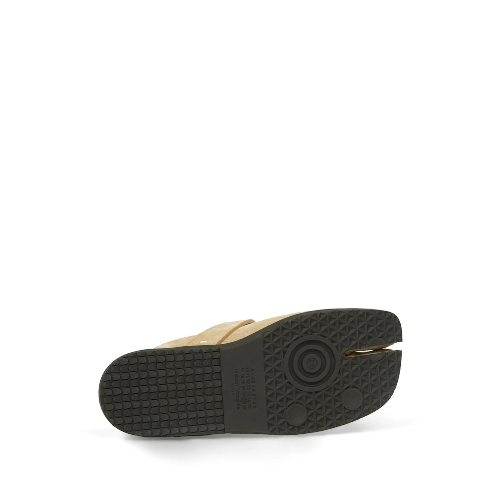 Maison Margiela sneakers in neutral calf suede — styling view | La Parisienne Qatar