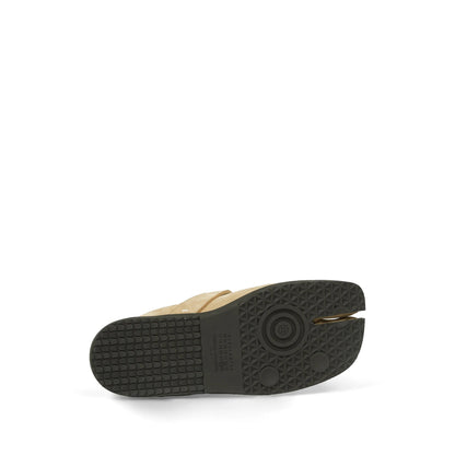 Maison Margiela sneakers in neutral calf suede — styling view | La Parisienne Qatar