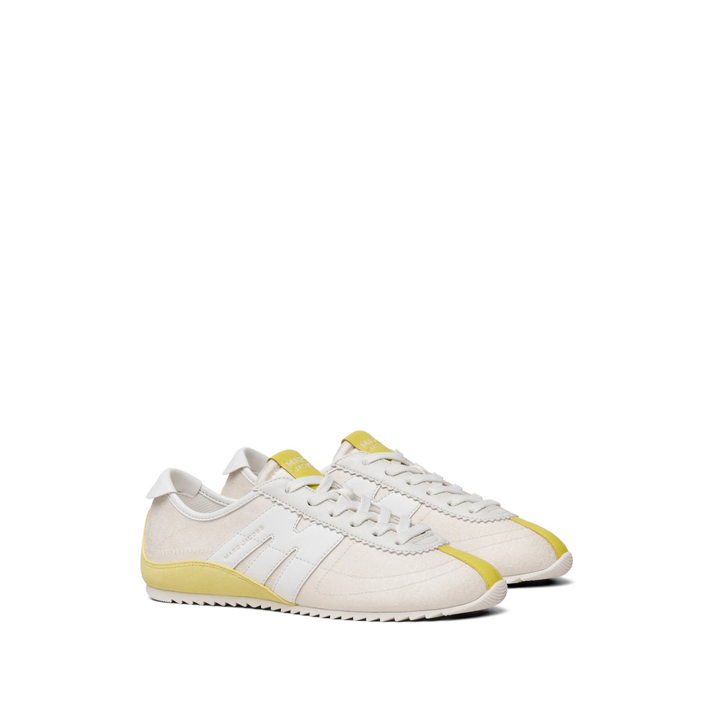 Marc Jacobs sneakers in neutral tones — styling view | La Parisienne Qatar