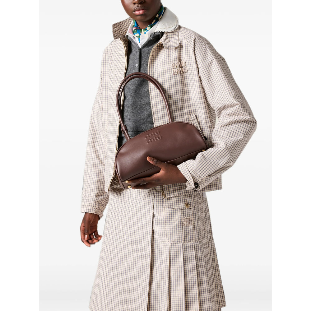 Miu Miu bag in brown calfskin — side profile | La Parisienne Qatar