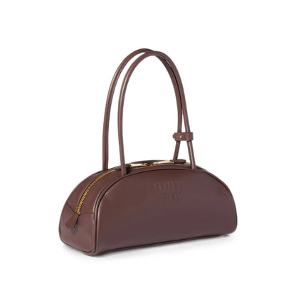 Miu Miu bag in brown calfskin — detail view | La Parisienne Qatar