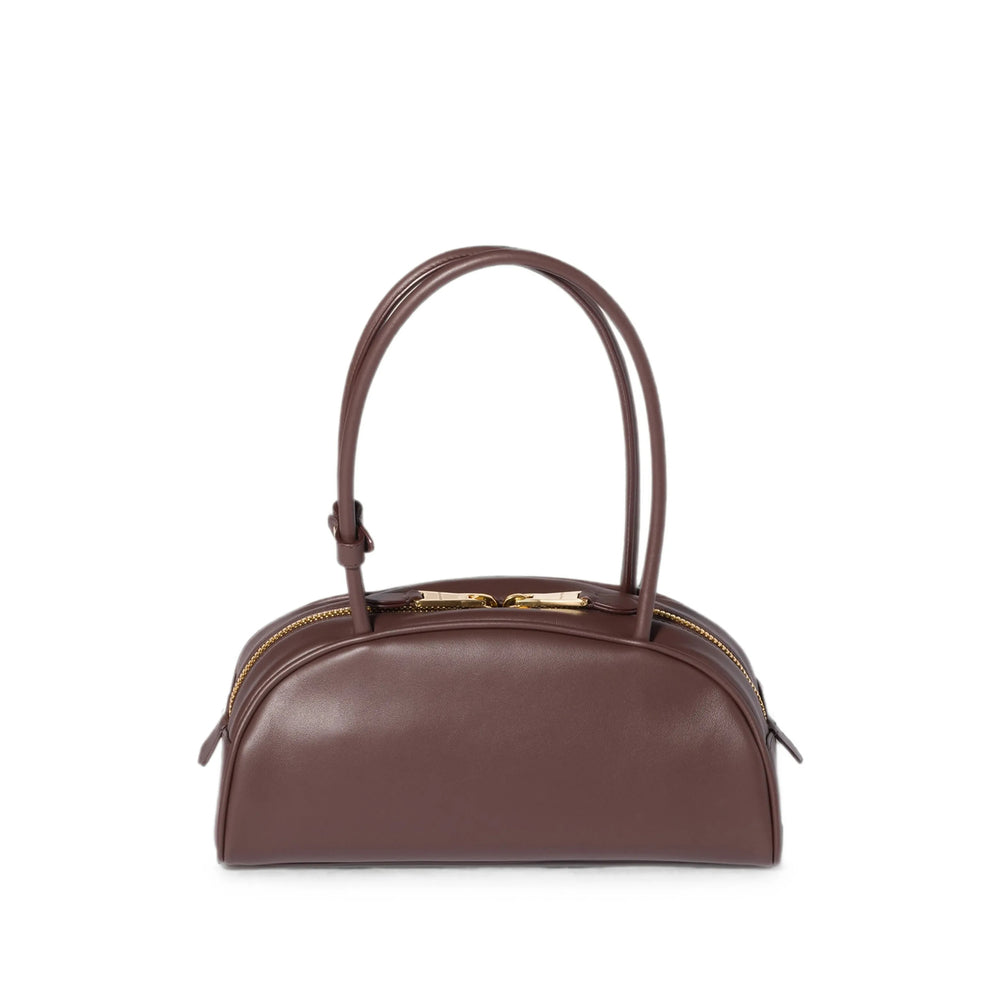 Miu Miu bag in brown calfskin — styling view | La Parisienne Qatar