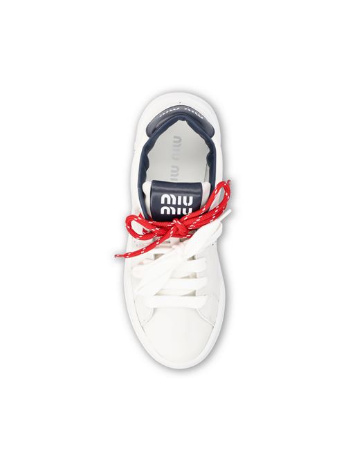 Miu Miu leather sneakers in white and blue — side profile | La Parisienne Qatar