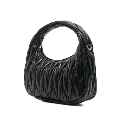 Miu Miu matelassé shoulder bag in black lambskin — rear view | La Parisienne Qatar