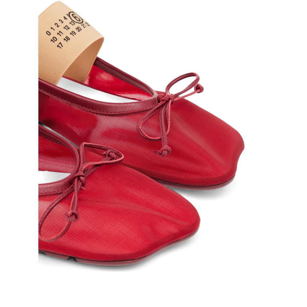 MM6 Maison Margiela sneakers in red — side profile | La Parisienne Qatar