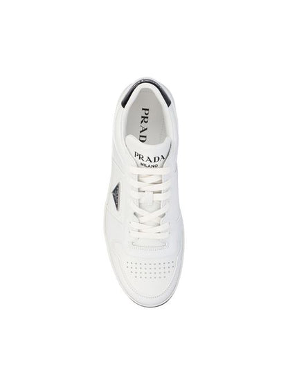 Prada Downtown sneakers in black and white calfskin — side profile | La Parisienne Qatar
