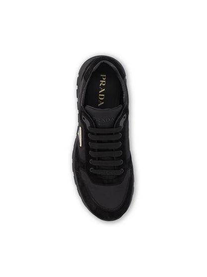 Prada Prax 20 sneakers in black Re-Nylon and suede — side profile | La Parisienne Qatar