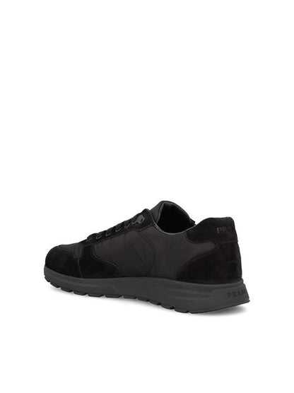 Prada Prax 20 sneakers in black Re-Nylon and suede — detail view | La Parisienne Qatar