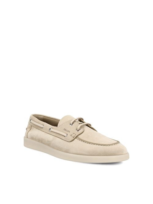Prada suede loafers in beige calfskin — rear view | La Parisienne Qatar