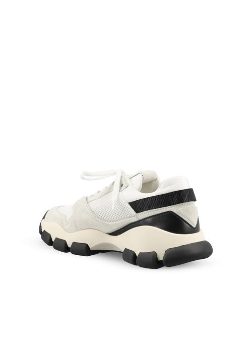 Prada technical mesh and suede sneakers in black and white — detail view | La Parisienne Qatar
